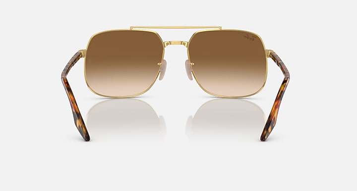 Gold and tortoise frame square sunglasses with brown lenses, front view