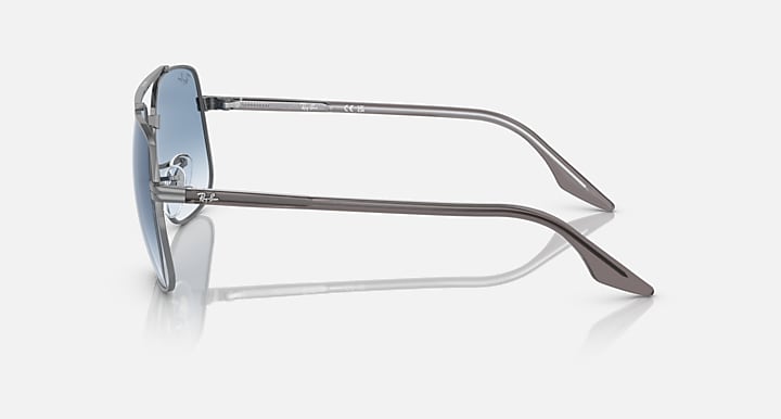 Side view square sunglasses with silver-tone frame and blue tinted lenses