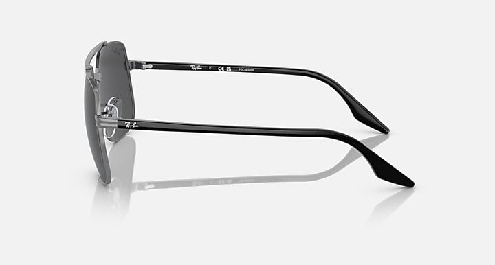 Side view square sunglasses with dark frame and black tinted lenses