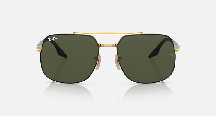 Gold-frame square sunglasses with dark green lenses