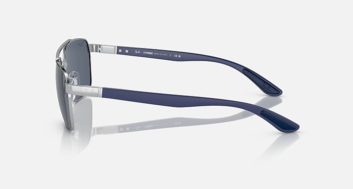 Liteforce sunglasses, blue frame, side view with dark lenses