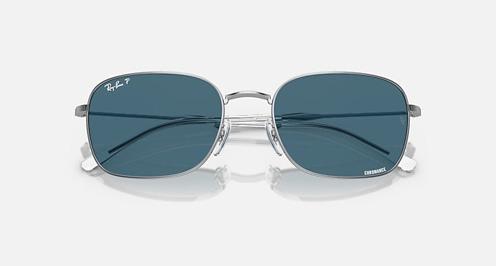 Ray-Ban RB3706 sunglasses with blue lenses and silver frame, front view with mirrored glare