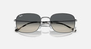 Rectangular sunglasses, dark lenses, tortoiseshell temples, thin metal frame