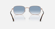 Rectangular sunglasses, rose-gold frame, blue gradient lenses with dark upper tint