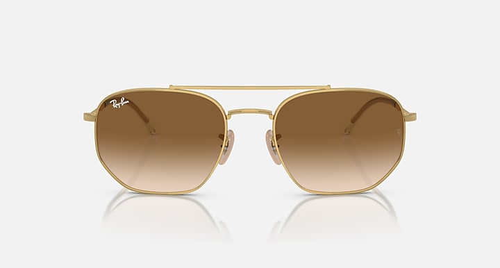Gold-tone sunglasses with oval brown gradient lenses, front view