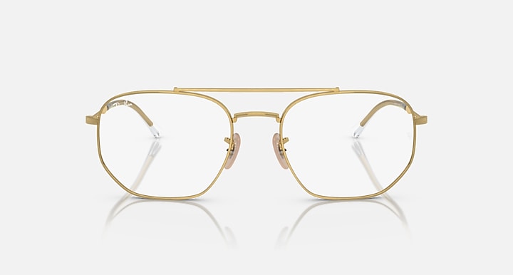 Gold rectangular sunglasses with clear lenses, front view.