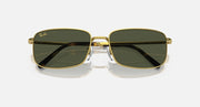 Gold-framed square sunglasses with dark lenses and metal bridge detail