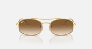 Ray-Ban square sunglasses with gold frame and amber gradient lenses, front view