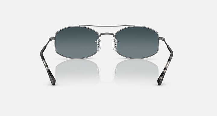 Ray-Ban RB3719 sunglasses with dark blue lenses and silver frame, black temples
