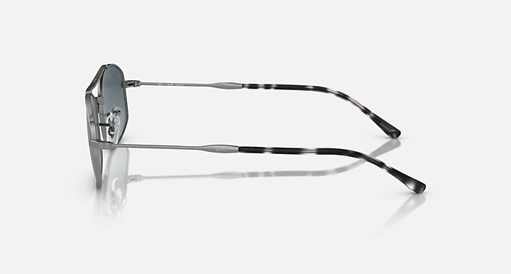 Ray-Ban RB3719 sunglasses with silver metal frame and striped black temples, side view
