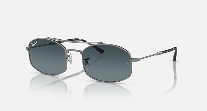 Ray-Ban RB3719 sunglasses with dark blue lenses and silver metal frame, side profile