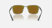 Ray-Ban Chromance rectangular sunglasses with warm gold mirrored lenses and dark metal frame