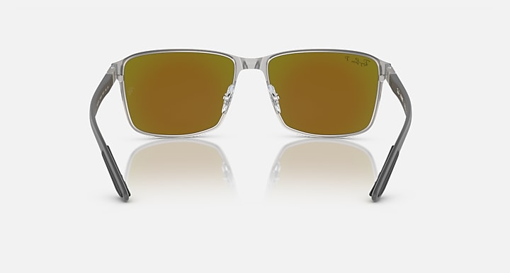 Ray-Ban Chromance rectangular sunglasses with warm gold mirrored lenses and dark metal frame