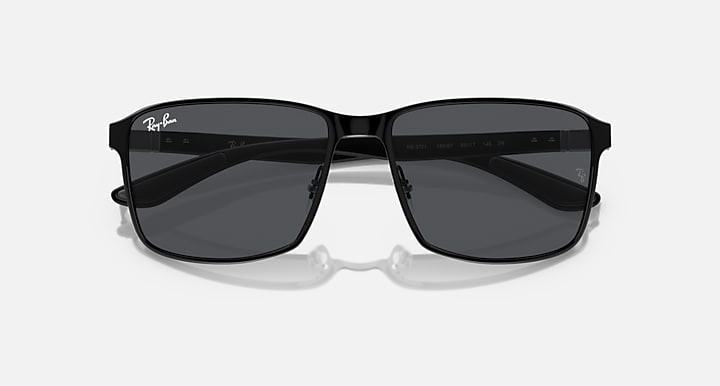 Rectangular square sunglasses with black frame and dark tinted lenses