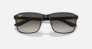 Square sunglasses with black frame and brown-tinted gradient lenses