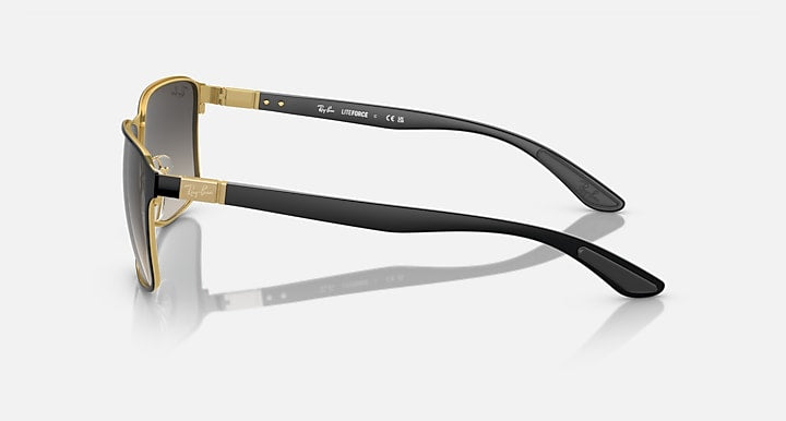 Side-view square sunglasses with black frame and gold-tone temples