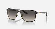 Square sunglasses with black frame, gold accents, and dark grey gradient lenses