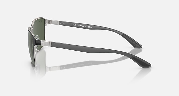 Ray-Ban side view sunglasses with dark green temples and dark green tinted lenses