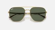 Gold aviator sunglasses with dark green tinted lenses and metal bridge