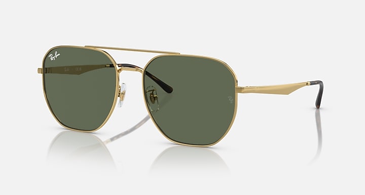 Gold aviator sunglasses with dark green lenses and angular metal temple details