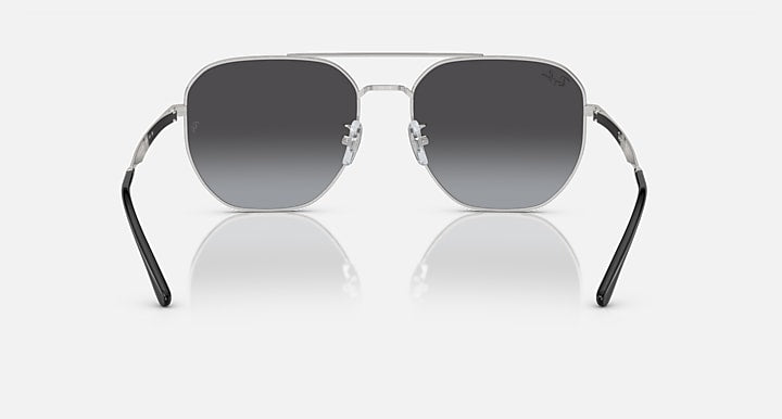 Ray-Ban aviator sunglasses with silver frame and dark grey lenses, centered view
