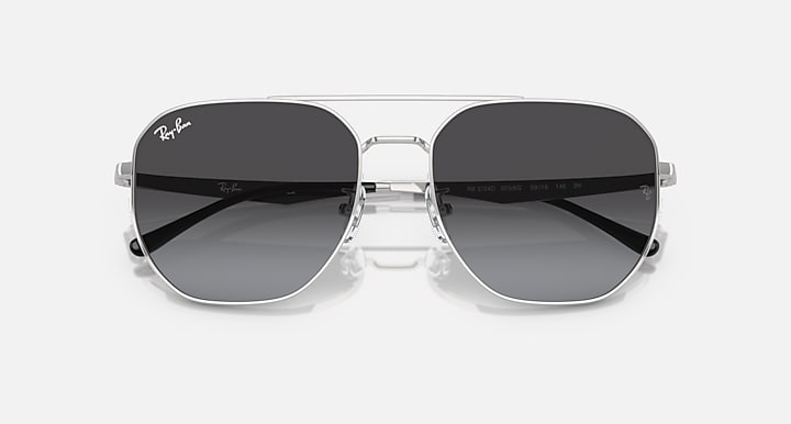 Ray-Ban aviator sunglasses with silver frame, dark lenses, front view