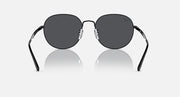 Round black sunglasses with dark gray lenses and curved temple arms