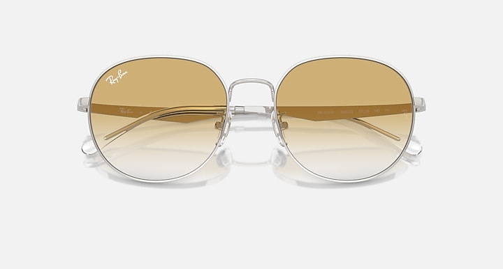 Round metal sunglasses with silver frame and amber gradient lenses, front view