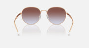 Round metal sunglasses with rose gold frame and dark brown gradient lenses, front view