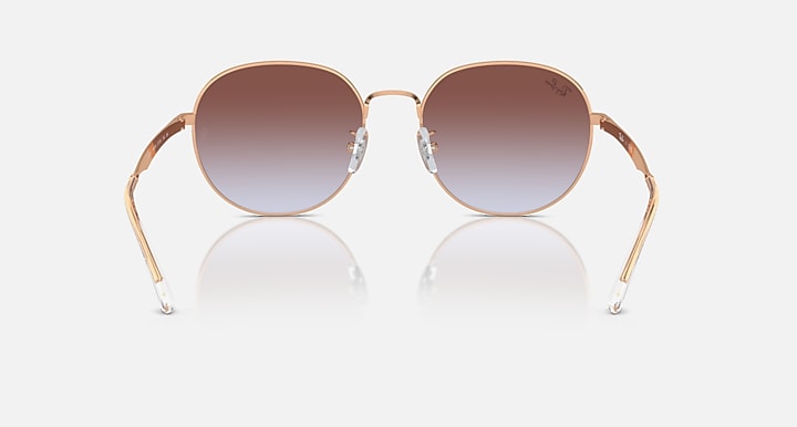 Round metal sunglasses with rose gold frame and dark brown gradient lenses, front view