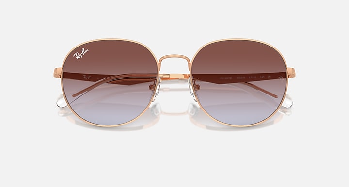 Round metal sunglasses with rose gold frame and deep brown gradient lenses, front view