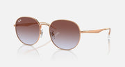 Round metal sunglasses with rose gold frame and dark brown gradient lenses