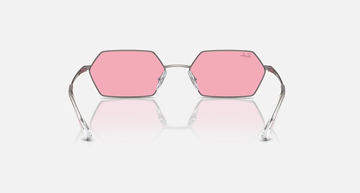 Hexagonal sunglasses with pink mirrored lenses and rose-pink frame, slightly angled