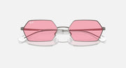 Hexagonal sunglasses with pink mirrored lenses, rose-pink metal frame and nose bridge