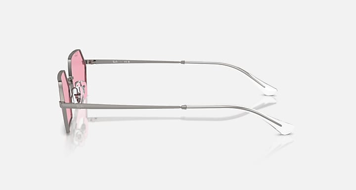 Hexagonal sunglasses side profile with pink mirrored lenses and rose-pink frame arms