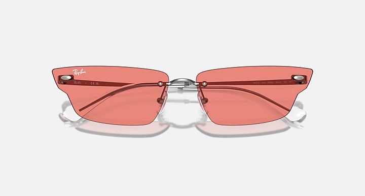 Ray-Ban coral pink sunglasses with red-orange lenses and metal bridge