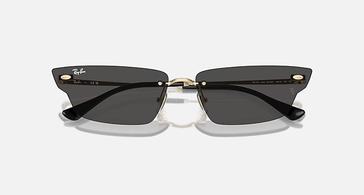 Ray-Ban black rectangular sunglasses with dark lenses and gold center bridge