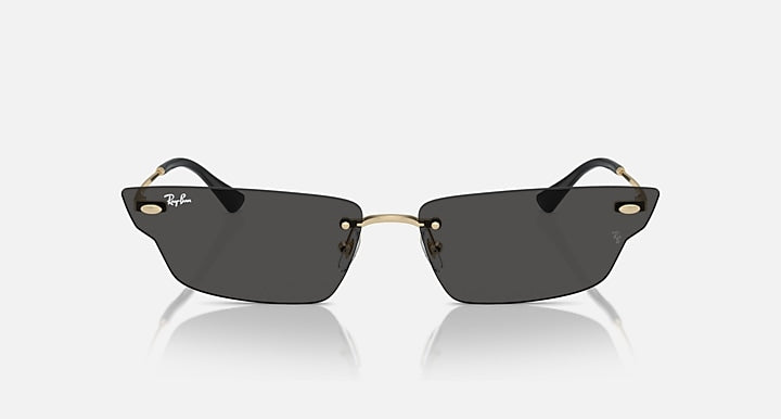 Ray-Ban black sunglasses with matte dark lenses and gold bridge details
