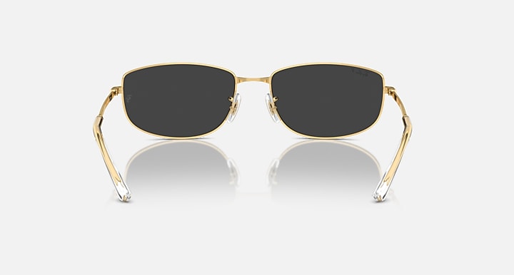 Gold-tone rectangular sunglasses with dark (black) lenses and reflective finish