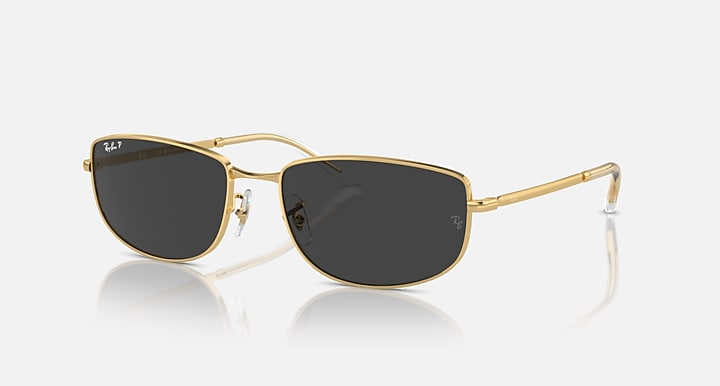 Gold-tone rectangular sunglasses with dark (black) lenses and slim metal frame