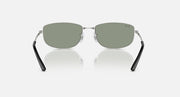 Silver sunglasses with olive-green lenses and black temple ends