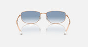 Rose gold sunglasses with blue mirrored lenses and metal bridge detail