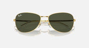 Gold-tone aviator sunglasses with dark green-to-black gradient lenses