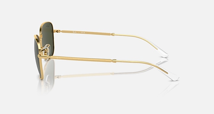 Gold-tone aviator sunglasses with clear temples and dark green lens front