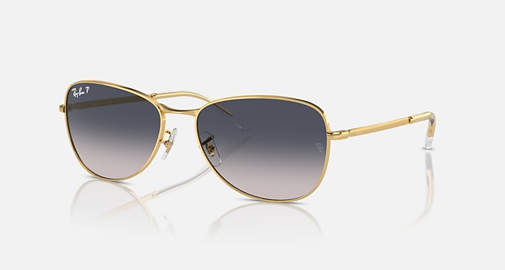 Ray-Ban RB3733 black sunglasses with gold trim and dark gradient lenses
