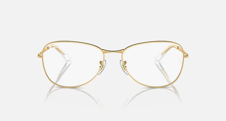 Ray-Ban RB3733 sunglasses, gold aviator-style frame with clear oval lenses