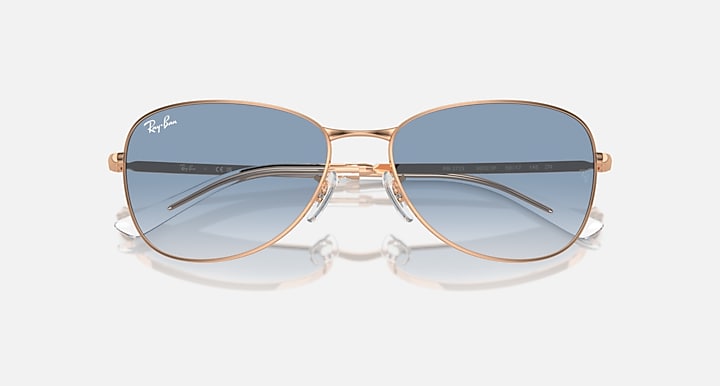 Ray-Ban RB3733 rose gold sunglasses with dark blue lenses and slim bridge