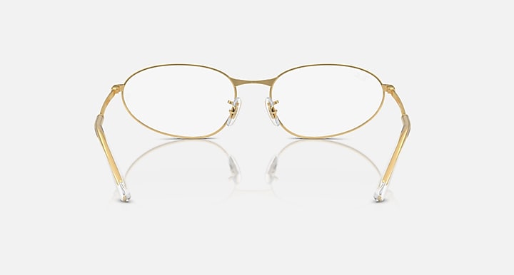 Gold metal round sunglasses with clear lenses and thin metal temples