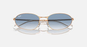 Gold-tone sunglasses with dark blue lenses and reflective gradient tint