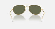 Gold aviator sunglasses with dark green lenses and transparent nose bridge